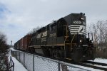 NS D53 passes Ferguson Station in the Snow